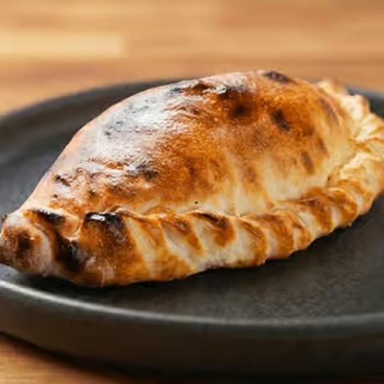 Savor Our Calzone Today